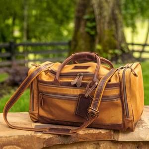 NEW MADISON CREEK OUTFITTERS men's canvas duffle bag in brown